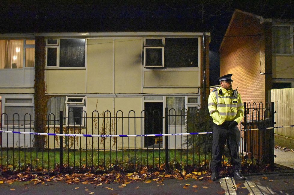 Police at the scene in Nottingham after two children died and a woman was left critically injured in a fire at a flat. Picture date: Sunday November 20, 2022.