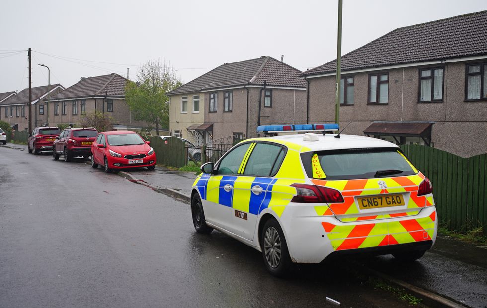 Police at the scene in Pentwyn, Penyrheol, near Caerphilly, where a 10-year-old boy has died following reports of a dog attack on Monday. The dog was destroyed by firearms officers and no other animals were involved in the attack.
