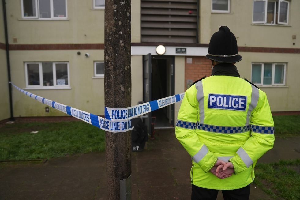 Police at the scene on Fownhope Close in Redditch, Worcestershire, where a 39-year-old man was shot by armed police on Christmas Eve