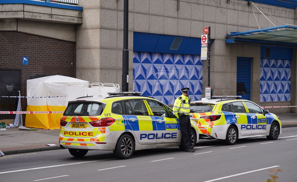 Police attend the scene in Croydon where a 15-year-old was stabbed to death