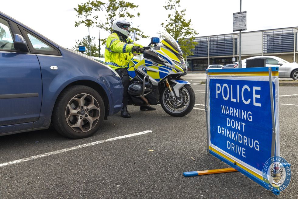 Police bike and drink-driving warning
