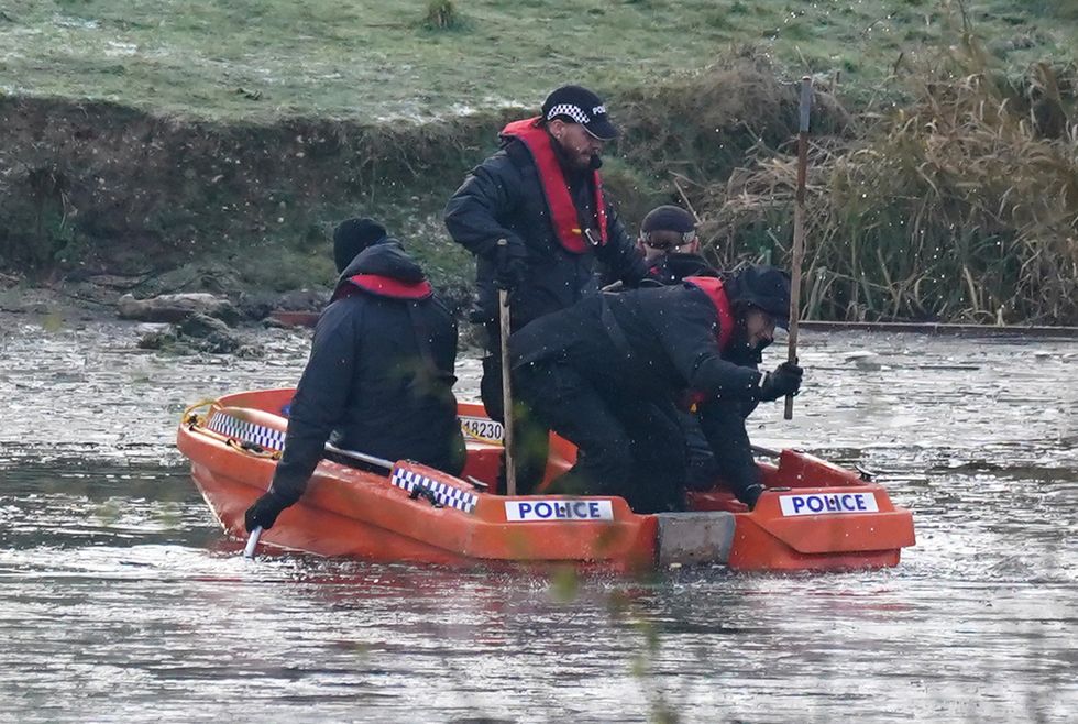 Police break the ice on the lake at Babbs Mill Park in Kingshurst. Picture date: Tuesday December 13, 2022.