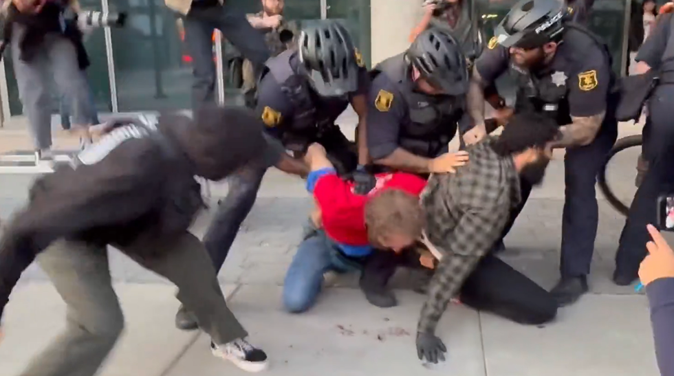 Police breaking up the brawl