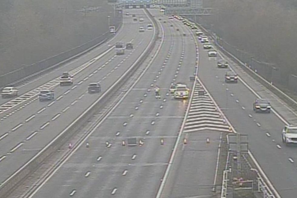 Police can be seen on the M3 following the incident