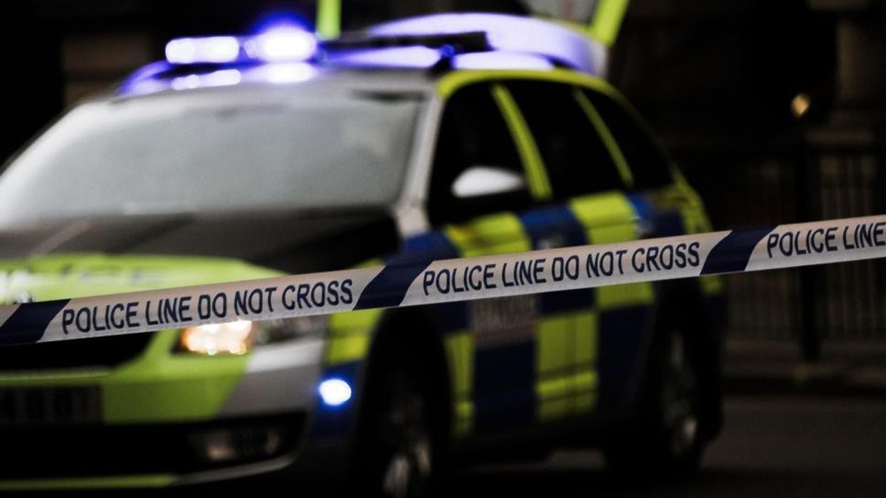 Police car and crime scene tape