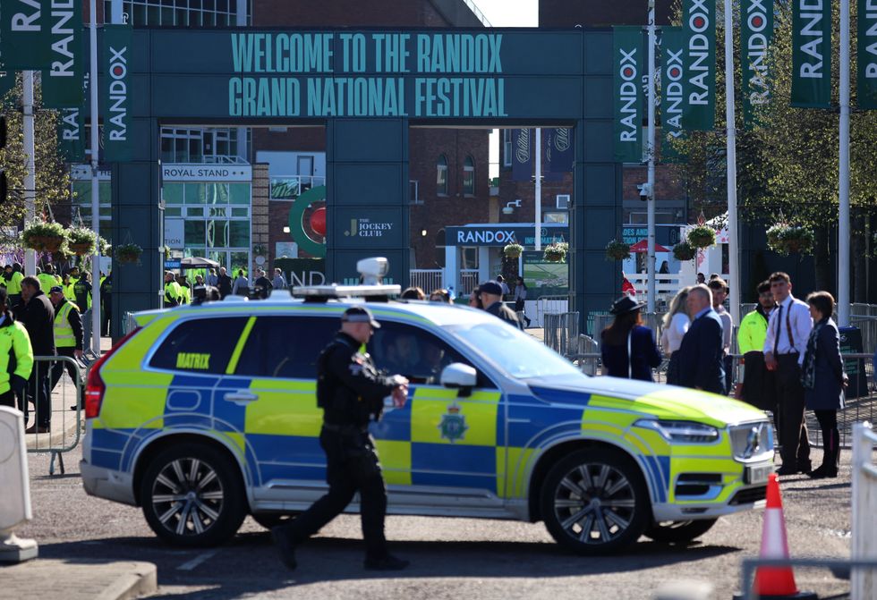 Police car and officers on standby at Aintree racecourse