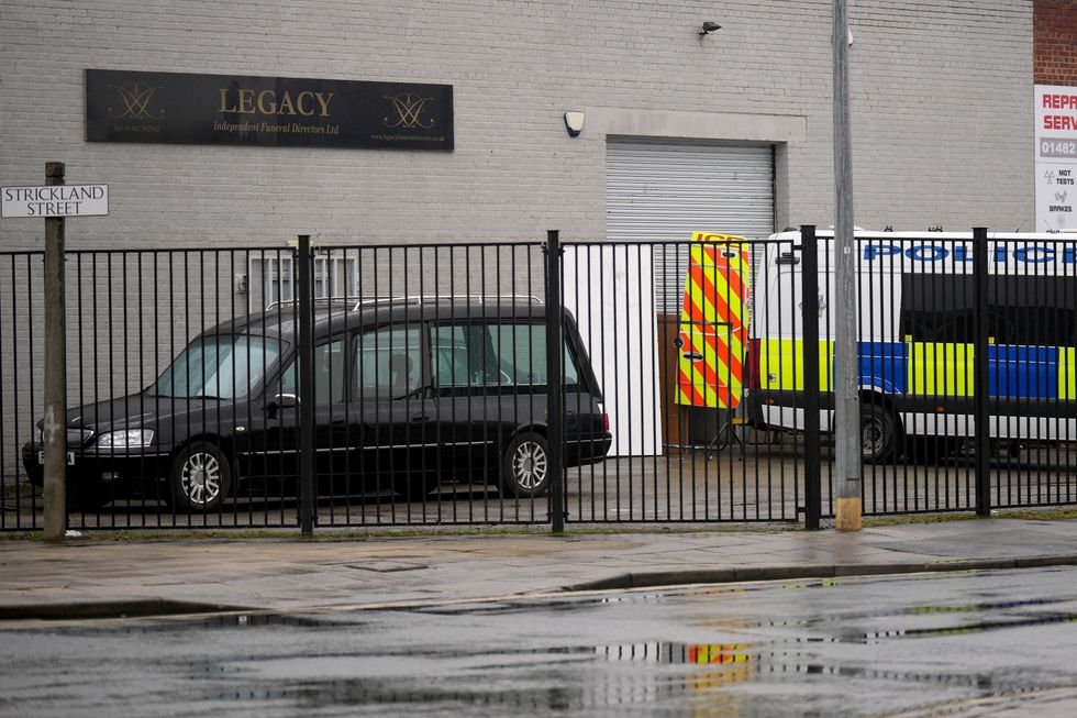 Police continue their investgations at the Hessle Road branch of Legacy Independent Funeral Directors