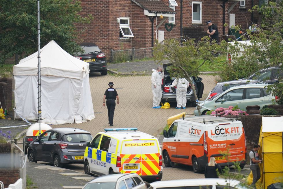 Police forensic work continues at the scene in Biddick Drive in the Keyham area of Plymouth where six people, including the offender, died of gunshot wounds in a firearms incident Thursday evening. Picture date: Friday August 13, 2021.