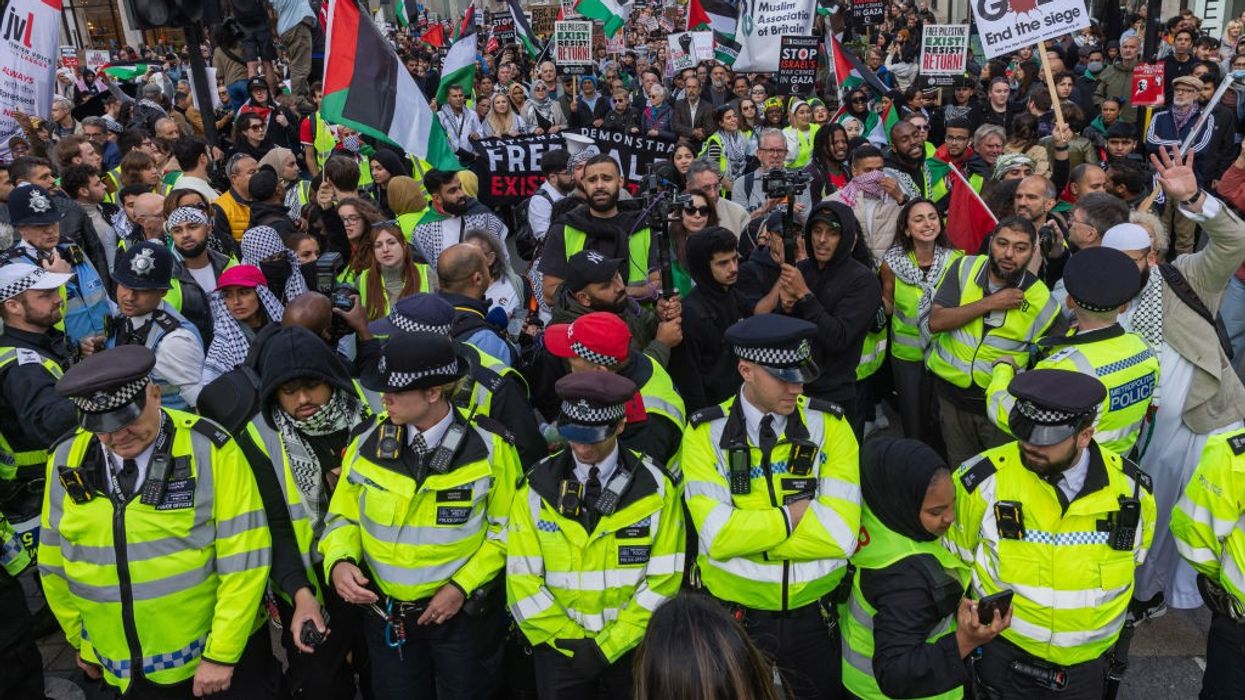 Police form a line in front of protesters