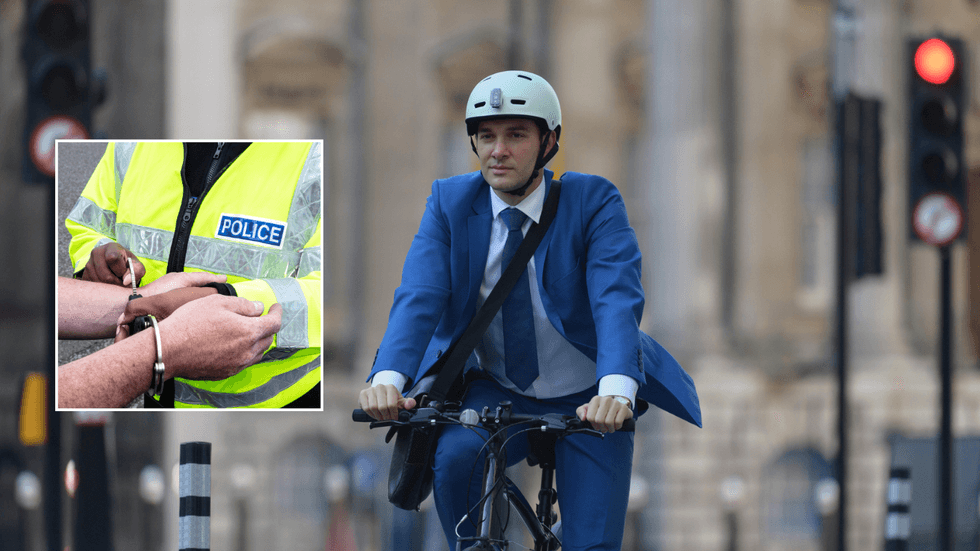 Police handcuffs and cyclists on the road