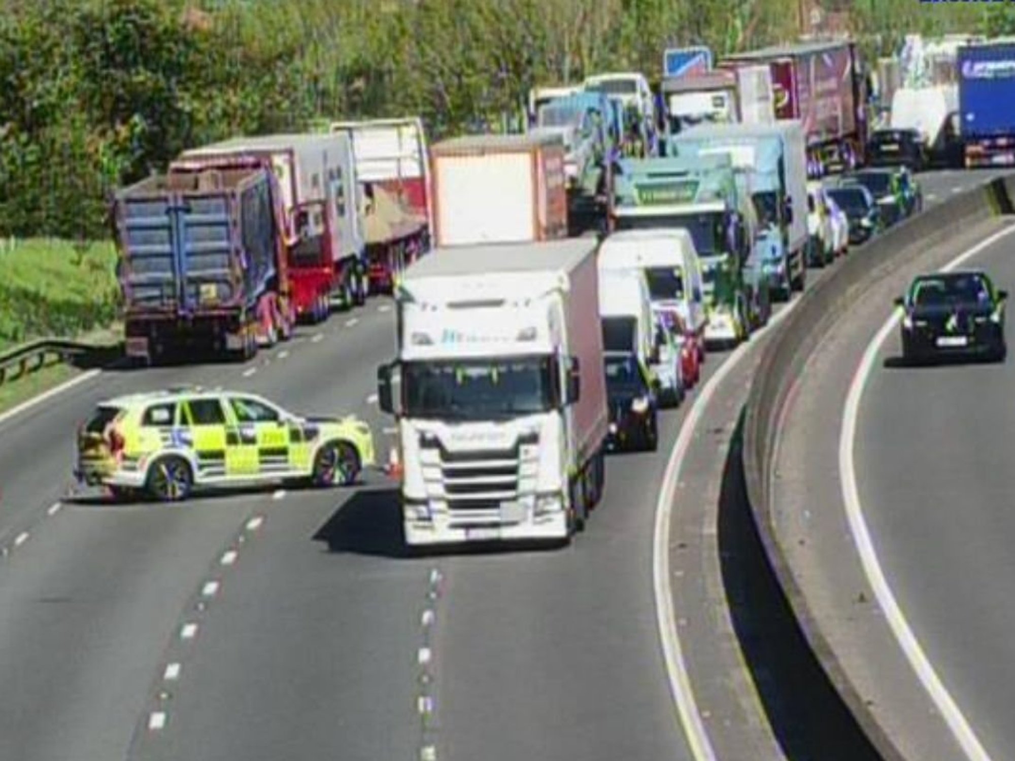 Police have blocked traffic access to the M6