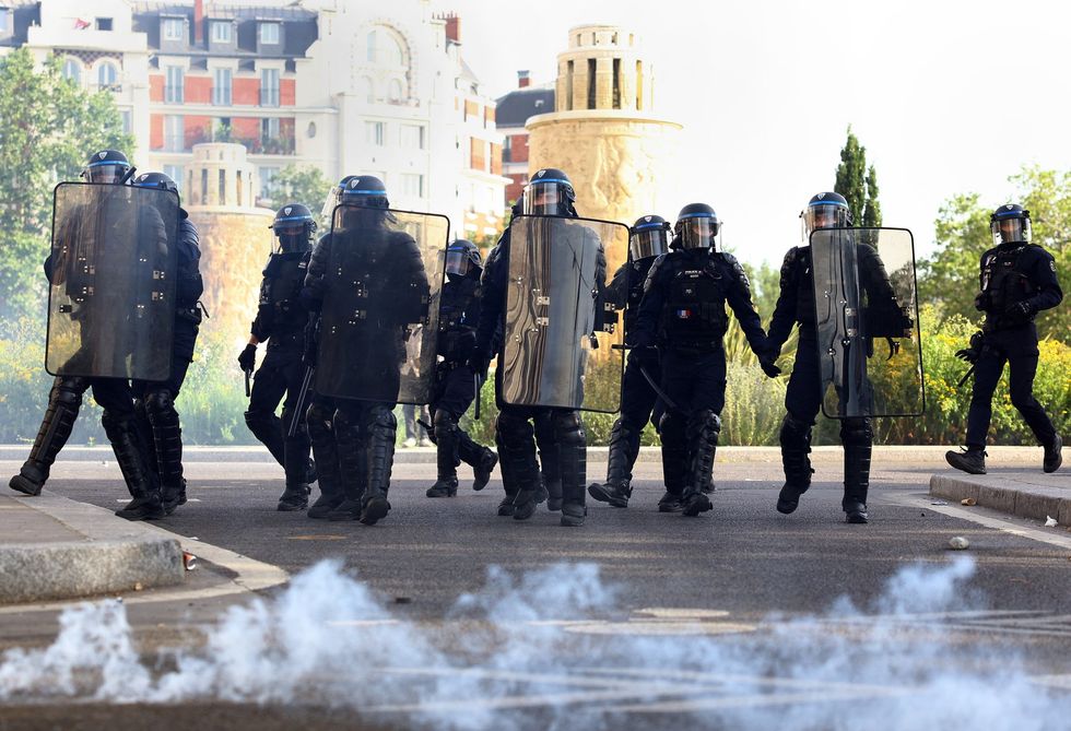 Police have had to intervene at the Parc des Princes where fans without tickets have been trying to break in