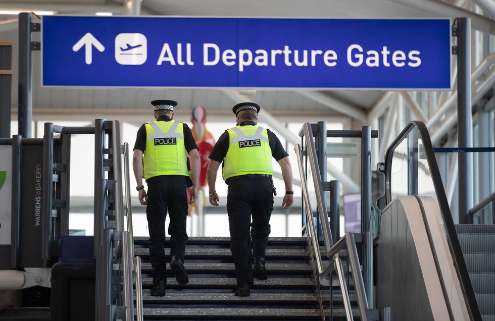 Police head for departure gates at Bristol Airport