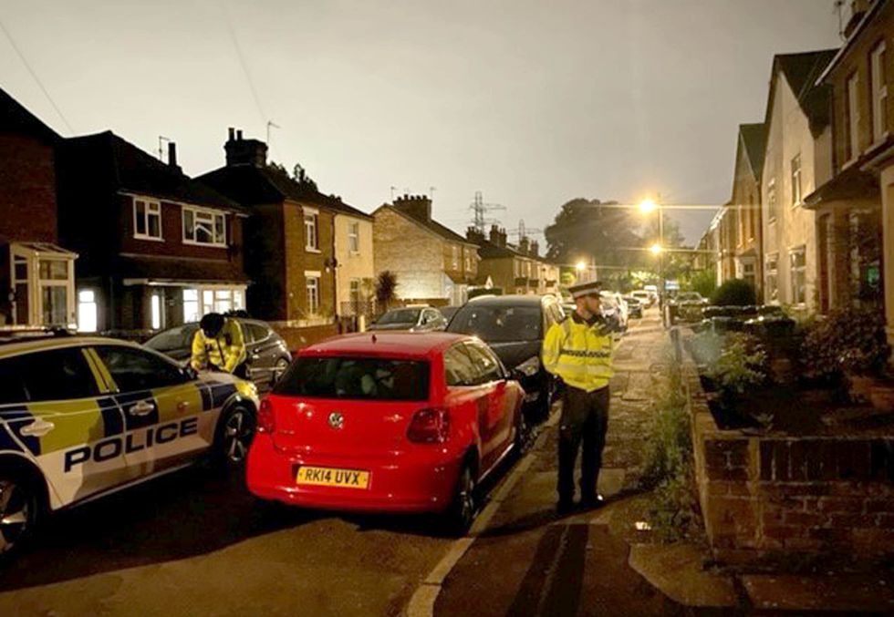 Police in Bremer Road, Staines-Upon-Thames near a property where three children and a man were found dead