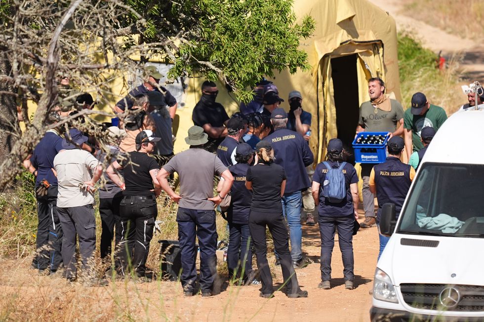 Police in Portugal celebrate the end of a search for Madeleine McCann in June