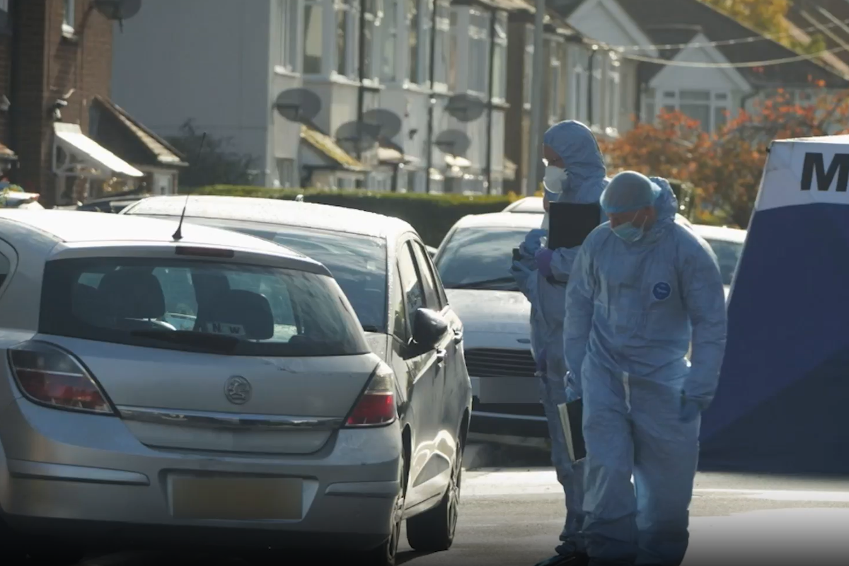 Police investigating the scene in Uxbridge