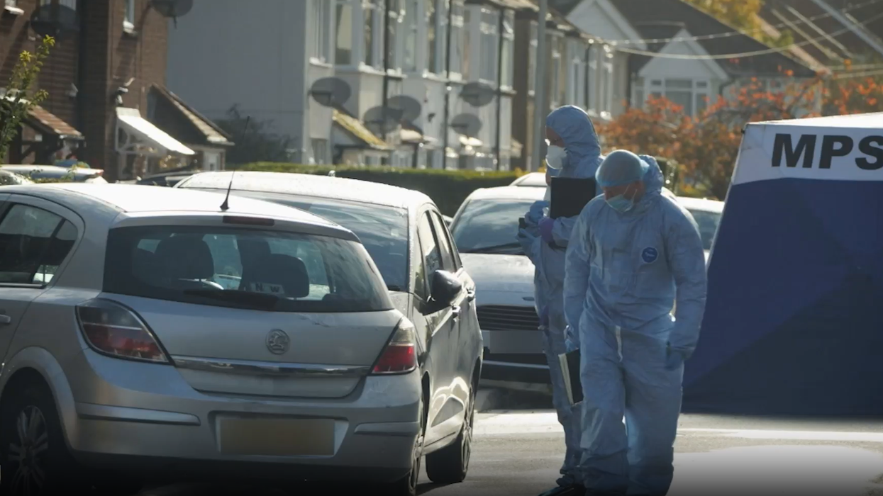 Police investigating the scene in Uxbridge