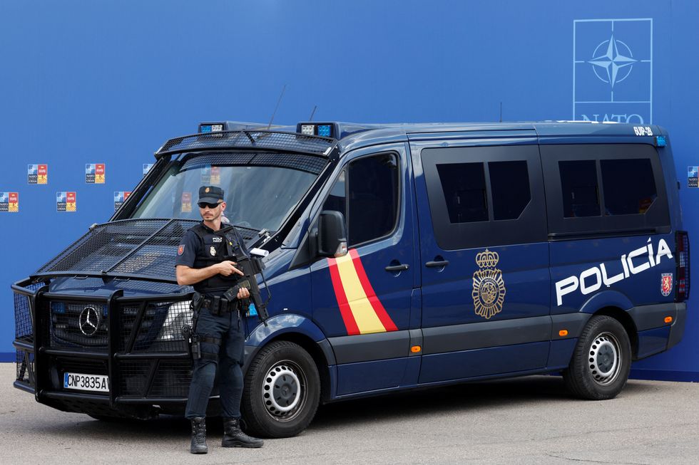 Police keep guard inside the Madrid Fair ahead of NATO Summit, in Madrid, Spain, June 27, 2022. REUTERS/Yves Herman