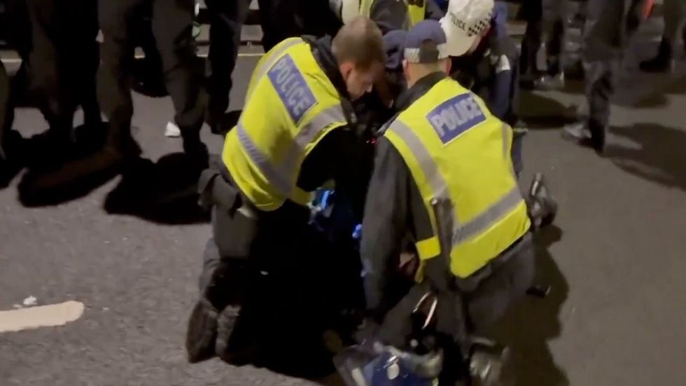 Police make arrests outside the Iran embassy in London
