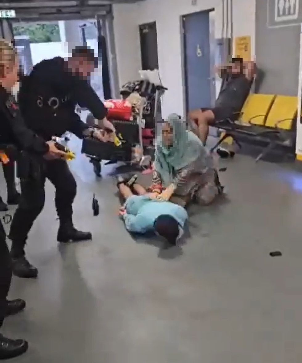 Police officer involved in Manchester Airport arrest 'removed from operational duties' after 'shocking' footage goes viral