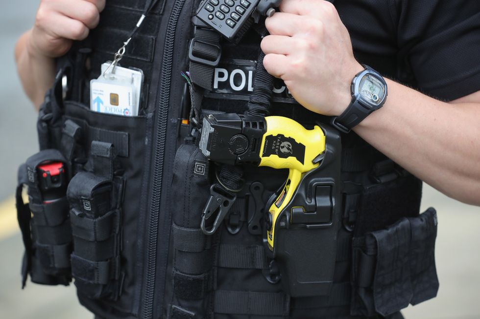 Police officer with a Taser