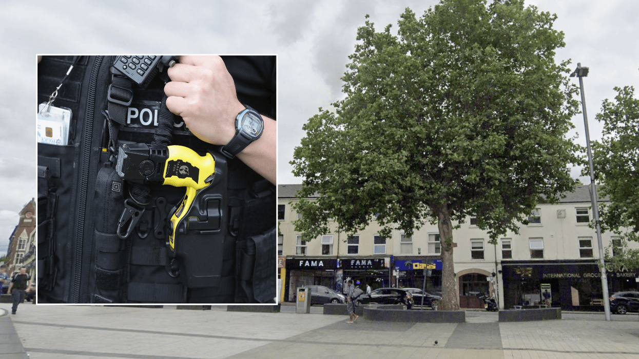 Police officer with a Taser
