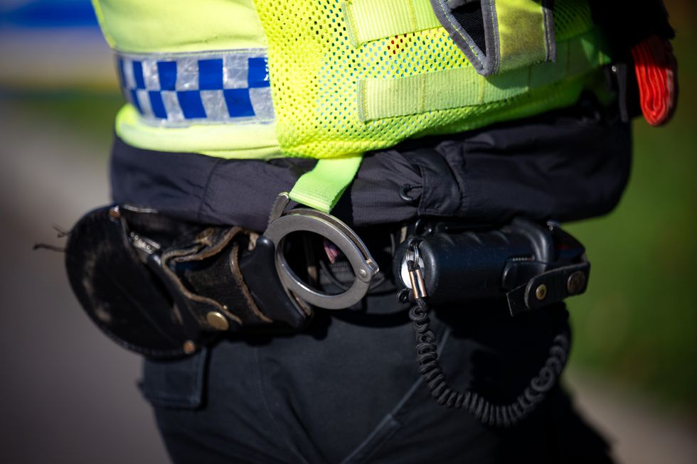 Police officer with handcuffs