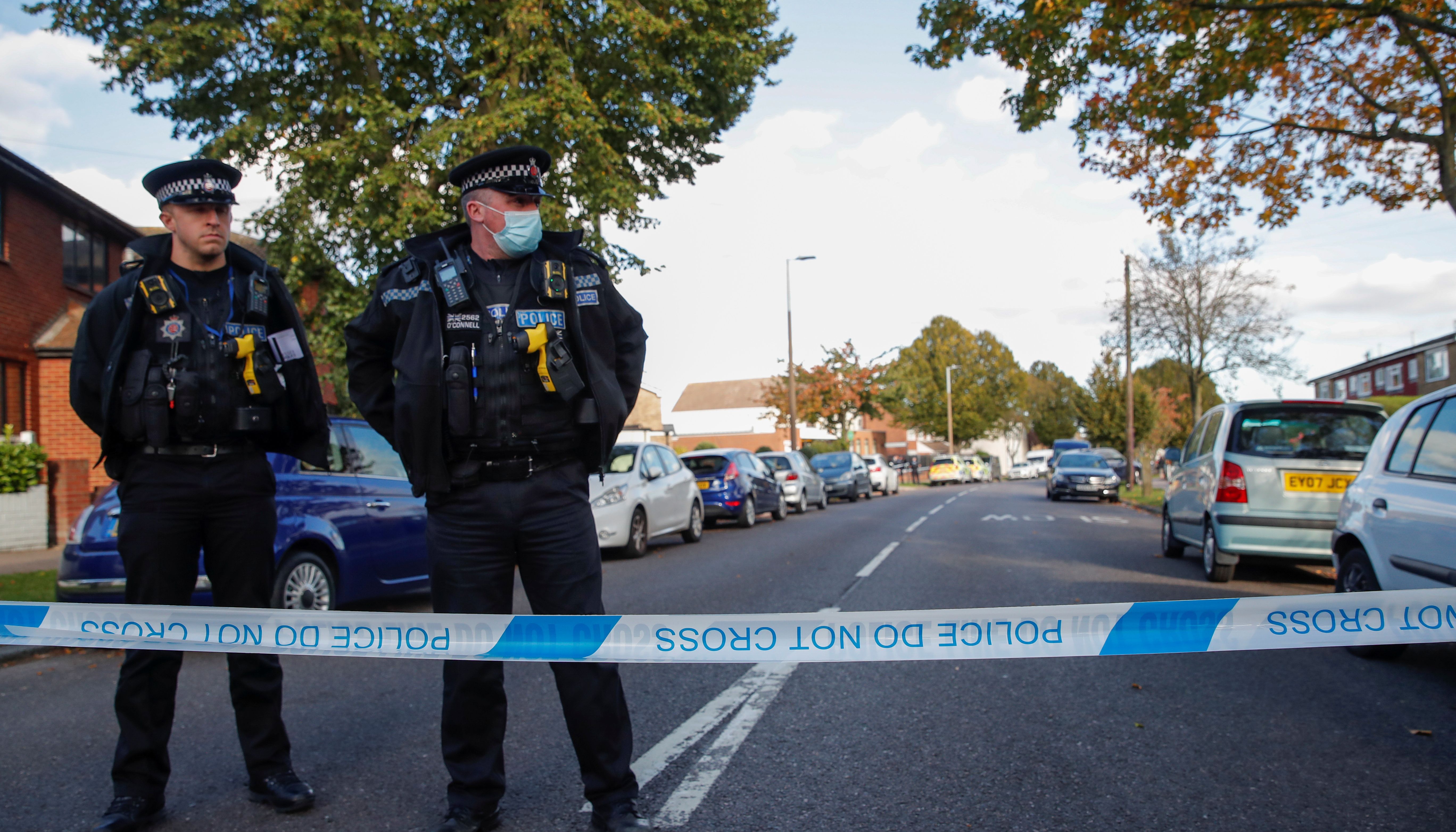 Police officers are seen at the scene where MP David Amess was stabbed during constituency surgery, in Leigh-on-Sea, Essex.