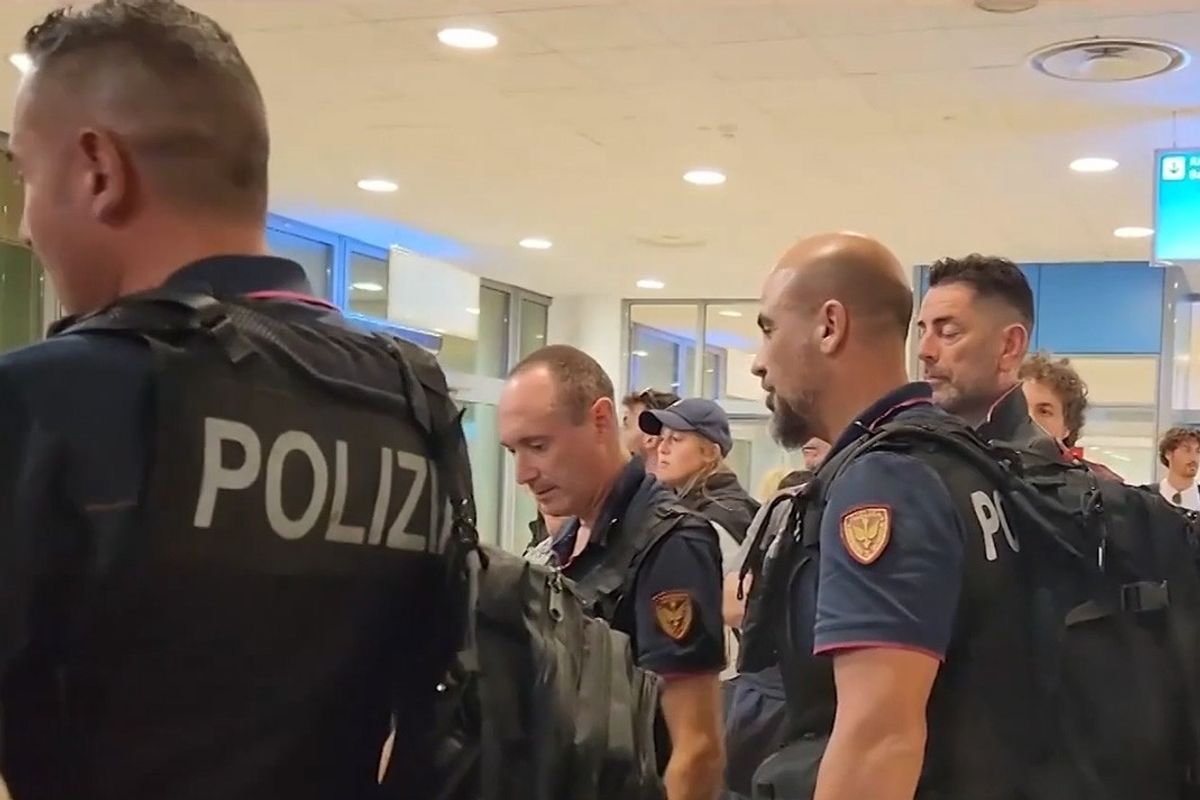 Police Officers arrive at Lampedusa Airport