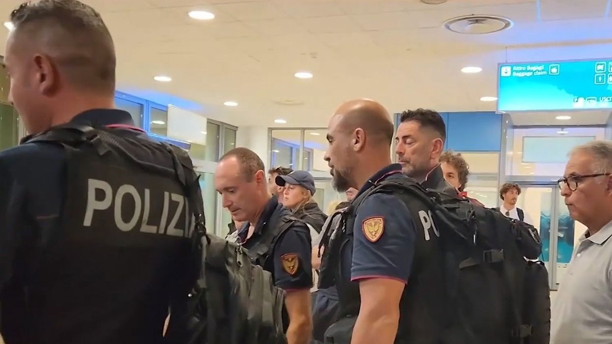 Police Officers arrive at Lampedusa Airport