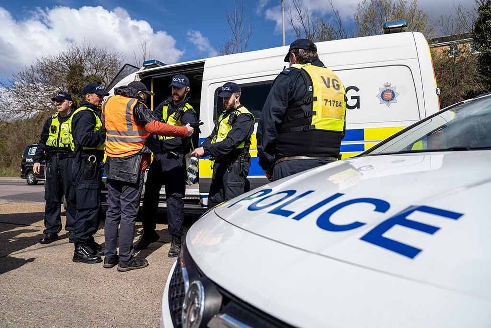 Police officers at a protest in Thurrock, Essex.