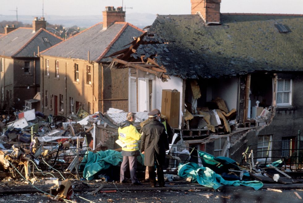 Police officers at the scene in Lockerbie, Scotland, after a Boeing 747 aeroplane, Pan Am Flight 103, crashed after a mid flight explosion on board. The disaster killed 270 people - all 259 passengers and 11 people on the ground.