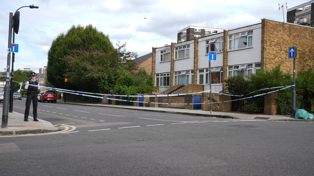 Police officers at the scene in West London