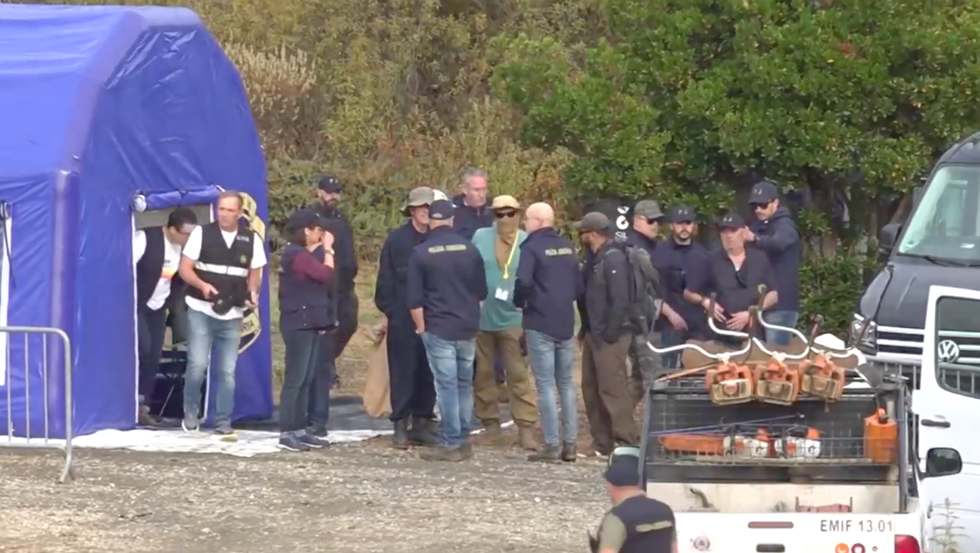 Police officers briefed in blue tents