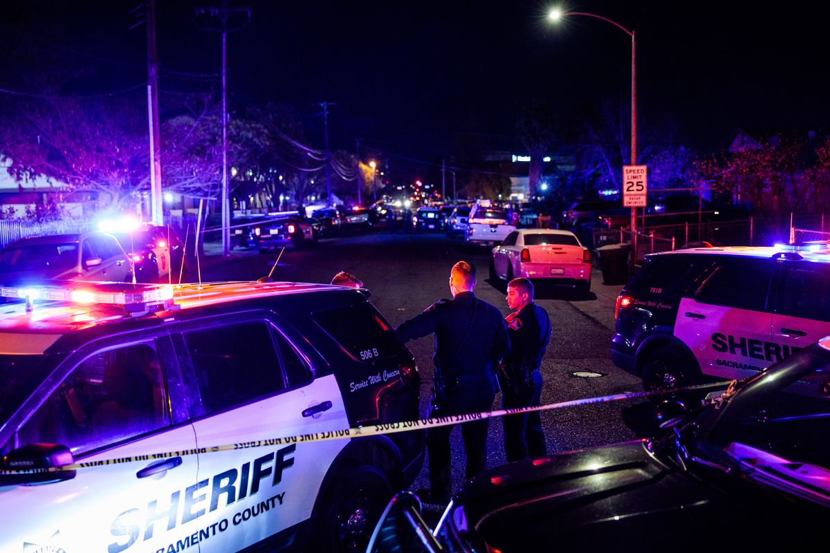 Police officers investigate the scene of a shooting at The Church in Sacramento on February 28, 2022, in Sacramento