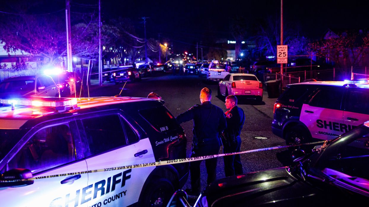 Police officers investigate the scene of a shooting at The Church in Sacramento on February 28, 2022, in Sacramento