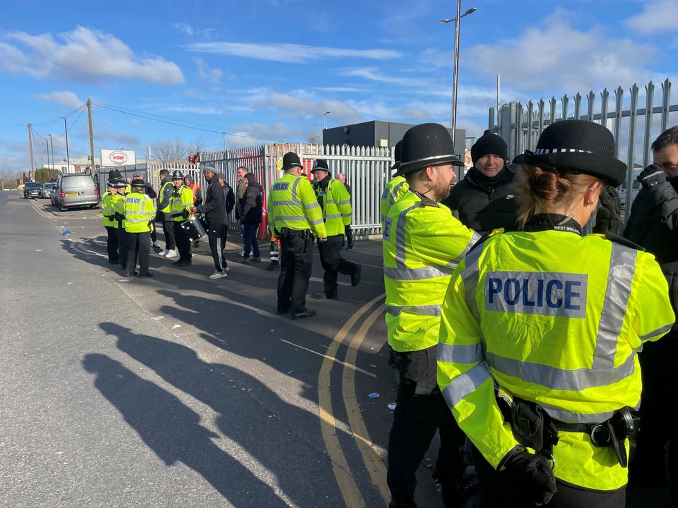 Police officers on hand as members of Unite go on the picket line at Birmingham City Council's Atlas Depot
