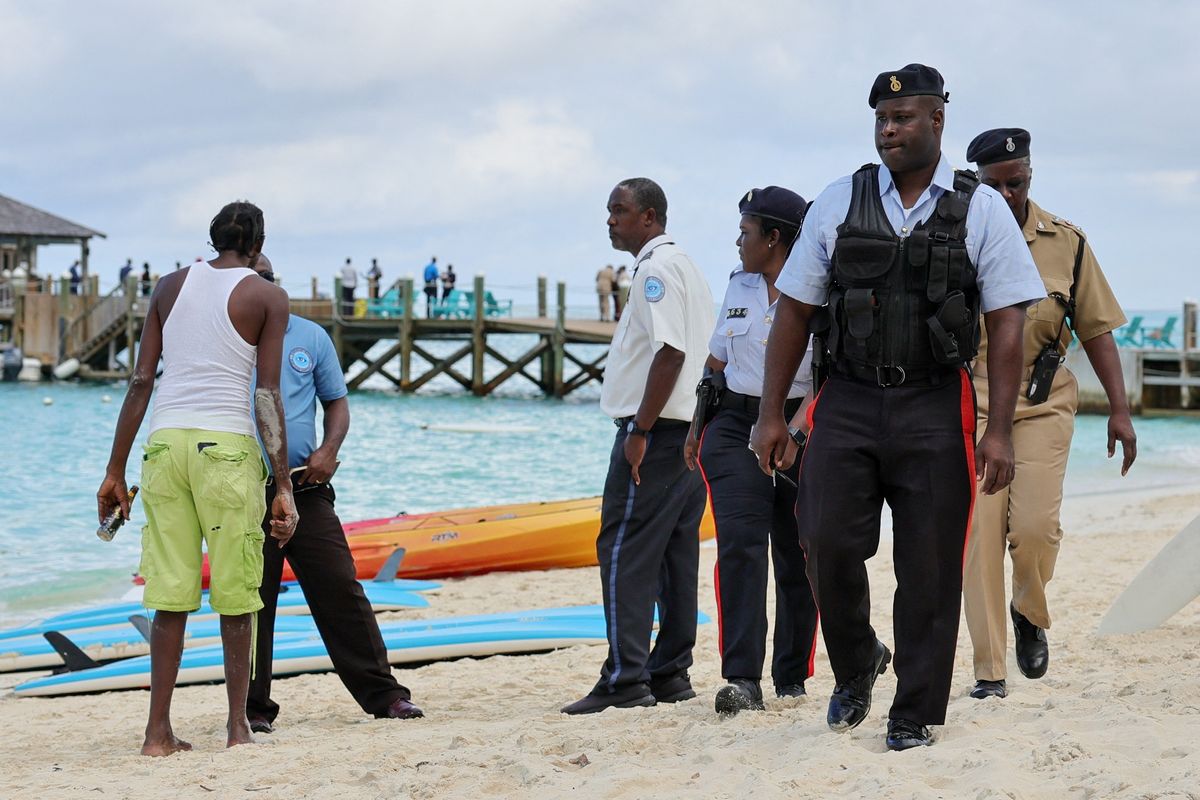 Police officers on the beach