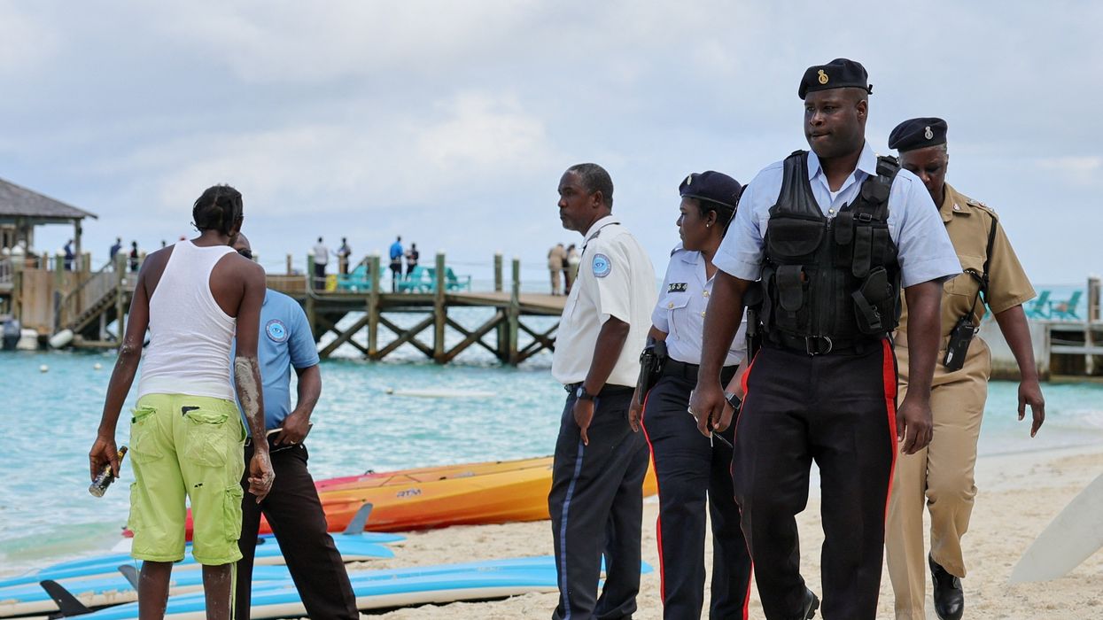 Police officers on the beach