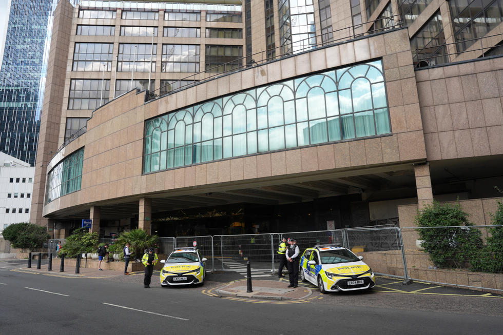 Police officers outside the Canary Wharf hotel (file pic)