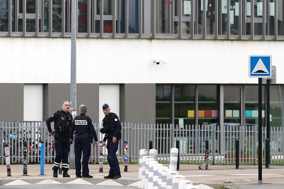 Police outside Notre-Dame-de-Toutes-Aides