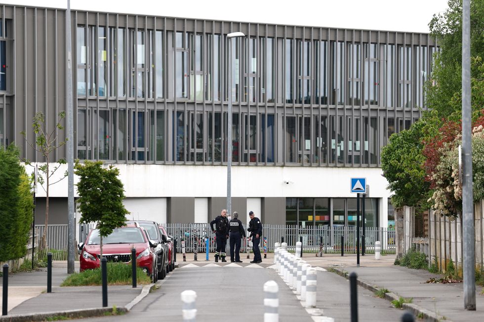 Police outside Notre-Dame-de-Toutes-Aides