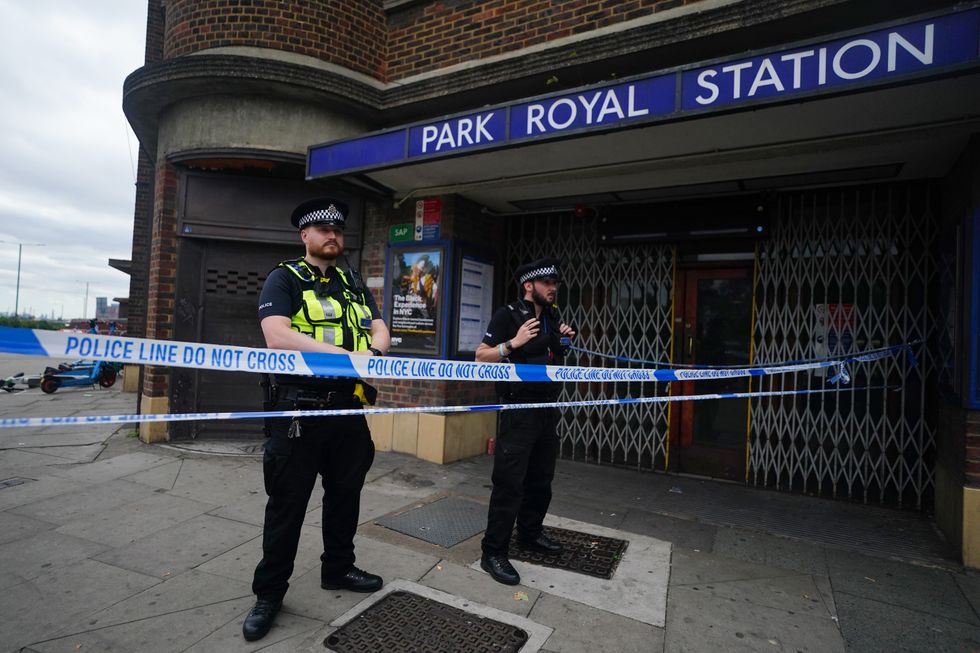 Police outside Park Royal underground station, west London the scene of a fatal crash in which a Range Rover ended up on a railway track for the Piccadilly underground line. Picture date: Monday August 22, 2022.
