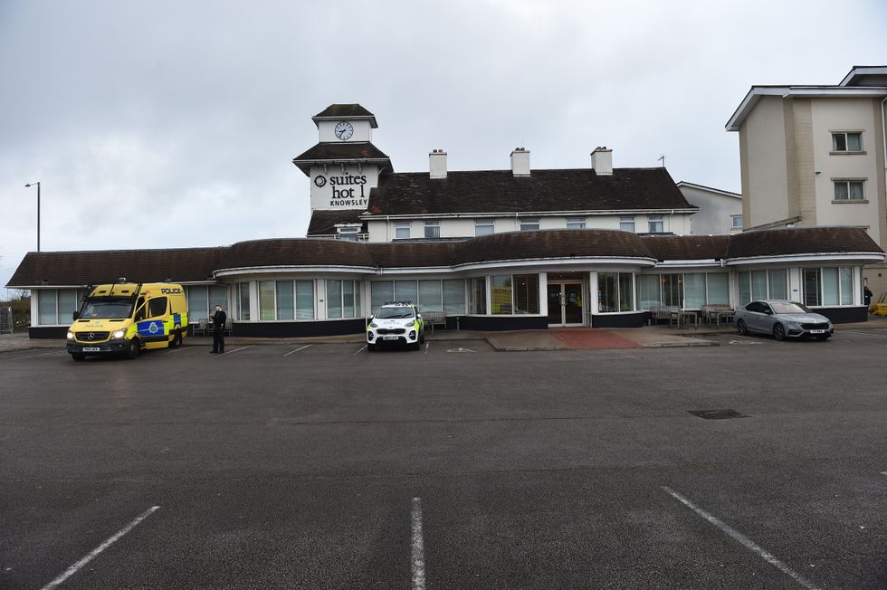 Police outside the Suites Hotel in Knowsley, Merseyside, after protestors demonstrated against asylum seekers staying at the hotel on Friday evening. Officers in Prescot, Knowsley, were dealing with two groups of protesters after a demonstration descended into chaos outside the Suites Hotel in Ribblers Lane. Picture date: Saturday February 11, 2023.