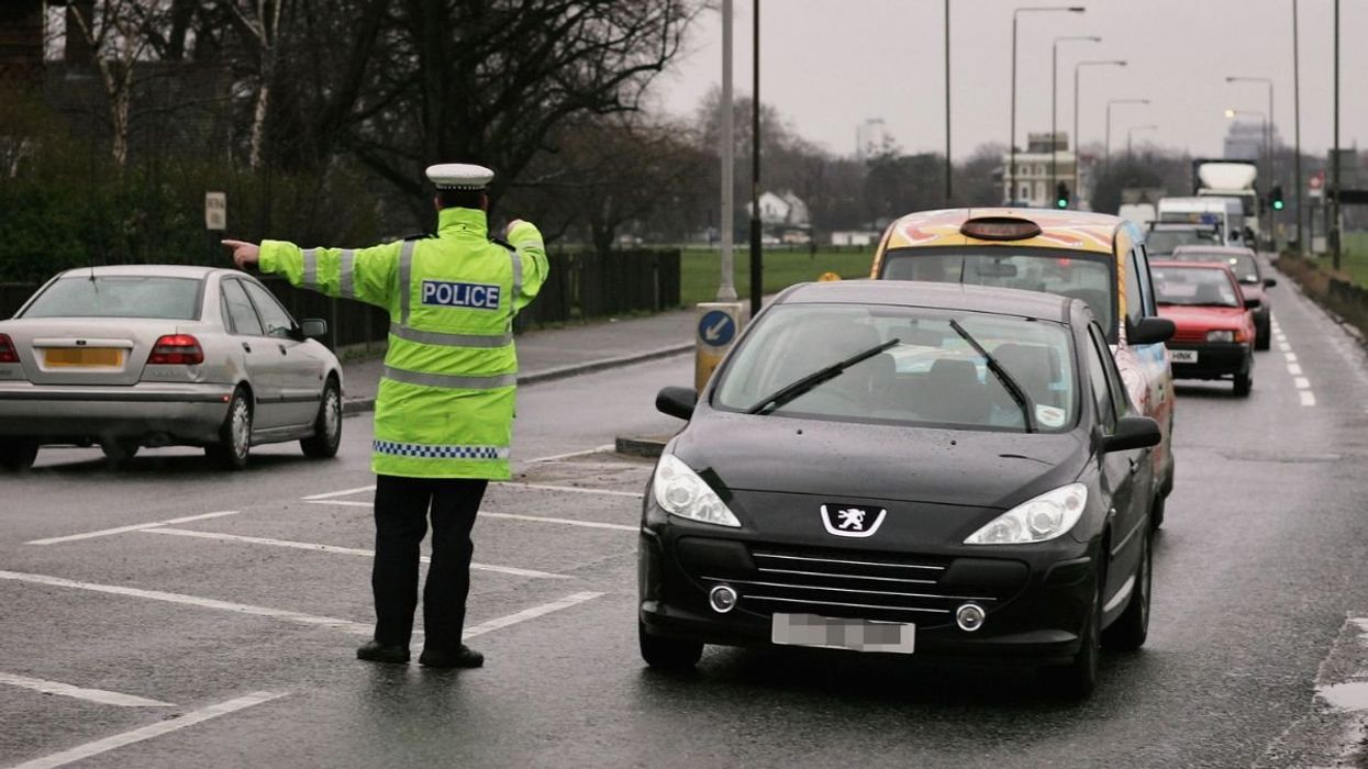 Police pulling over a vehicle