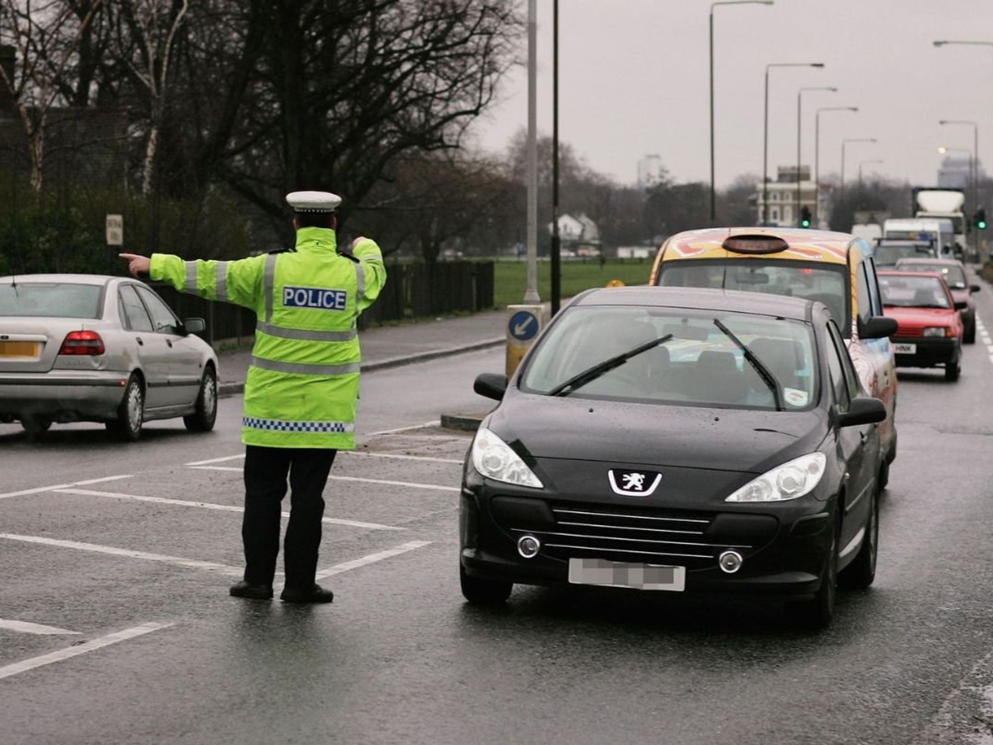 Police pulling over a vehicle