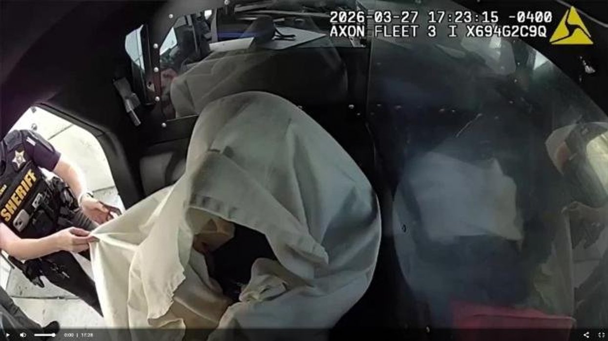Police release footage of Tiger Woods as they question golf star moments after DUI crash