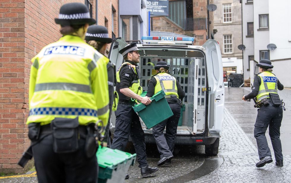 Police removing boxes from the SNP HQ in Edinburgh