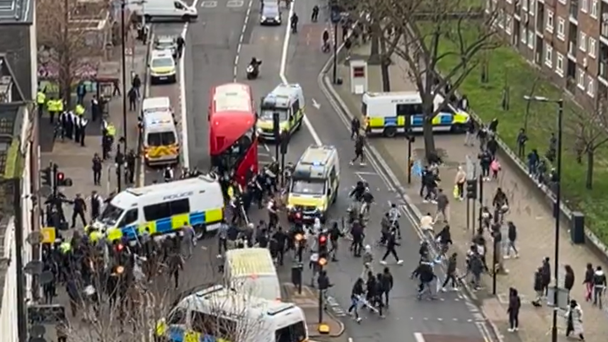 Police rush to 'big confrontation' in London as 50 'protesters' clash