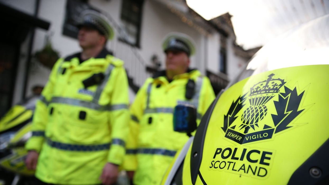 Police Scotland officers and motorcycle